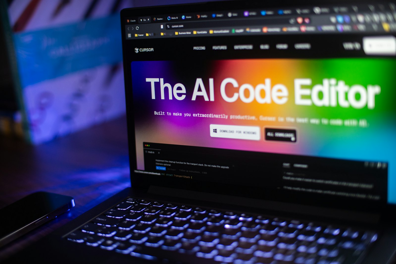 Developer workspace using AI tools on a laptop